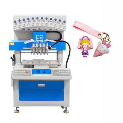 12 couleurs distributeur de PVC porte-clés en silicone machine de moulage par goutte-à-goutte pour la fabrication de patchs